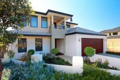 28 Samphire Turn, BEELIAR WA  With 4 Bedrooms, 2 Bathrooms and a huge list of features, this 2-Storey home built by In-vogue is truly in a class of its own. Inside the home there is solid wood flooring throughout, ducted rev/cycle air-conditioning, an oversized garage with shopper's entry, an alarm system, upstairs kitchenette and also ocean and city views from the top level. Out the back you will find a dream alfresco area with wooden decking and an outdoor kitchen with stone benchtops. All of this is directly opposite manicured parkland and there is reticulation both front and back. This quality home is going to be in high demand, so act fast and call Paul today! Property Features: - 4 Bedroom 2 Bathroom - In-Vogue 2-Storey - 430sqm Block - Ducted Reverse Cycle Air-Conditioning - Outdoor Kitchen - Decked Alfresco - Ocean & City Views - Directly Across From Manicured Parkland - Upstairs Kitchenette   