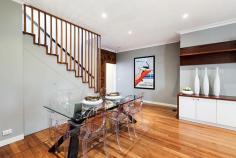 8 James Street Abbotsford VIC 3067 Dramatic, dynamic spaces of exceptional size await behind the classical cottage street presence of this brilliantly renovated, significantly extended Victorian. Living and dining areas of generous proportions demonstrate the desirability of this home's contemporary transformation, complemented by an open plan kitchen featuring stone benches, Bosch dish-washer and stylish storage while outlooks over the landscaped courtyard's decking and elegantly low-maintenance surroundings bring the outdoors in - and vice versa. Two large downstairs bedrooms share a generous, impressively appointed spa bathroom. Upstairs, the story takes a spectacular new turn. A massive main bedroom with balcony, walk in robes and double shower ensuite, luxuriously large additional living space and a versatile attic study or storage zone deliver amazing dimensions. Secure garage adds to the exceptional inner city appeal, literally moments from North Richmond station and all the Victoria Street attractions. 