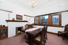 1156 Toorak Road, Camberwell, VIC, 3124 Occupying an elevated position, this graceful solid brick family home, surrounded by delightful trees has an abundance of space and natural light from the north Maintaining many original features of the era including leadlight windows, decorative high ceilings and picture rails, there is still scope to further update this grand residence to perfectly blend original charm with modern luxuries. The inviting entrance hall leads through to the formal lounge and separate formal dining (both with OFP) with three downstairs bedrooms serviced by main bathroom. The well equipped kitchen and adjacent family/meals proceed into the generously sized living room which flows out onto paved entertaining area and most favourable northern rear yard. The upper floor addition is ideal for a parent's domain with main bedroom (walk in robes and ensuite) opening onto delightful private timber deck with great aspects from a high vantage point. Spacious front and rear yards with double carport and workshop, complemented by distinguished greenery complete a well defined residence. Exceptionally sited only moments to tram, quality schooling and shops, this gracious home is ideal for the upcoming family lifestyle. Land: 18.8m x 46.8m (880sqm approx.) 