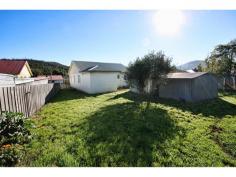   67 Bligh Street Warrane Tas 7018  This fantastic home is located just two blocks from Rosny Park services including Eastlands Shopping Centre and is close to schools and transport. The Kitchen is open to the dining, and there are ample cupboards and bench space. The separate lounge room is generous in size, light, bright, and sunny with a very efficient wood heater. There are four bedrooms, three of the bedrooms being a good size with the fourth being a walk through idea for a nursery or office. Outside there are low maintenance gardens which offer gated access to the large rear yard for parking, plus there is excellent storage options in the garden sheds. This is an ideal investment ready for you to move in or renovate and reap the rewards. 