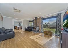 Shop 1 Birdwood Plaza, Shannon St Birdwood SA 5234 2.737ha (6.76 acres). Beautiful slightly elevated setting, providing great lifestyle options. Steel framed family orientated home with generous living areas and spectacular kitchen. Multiple sheds and very pretty land that includes large dam and more. LAND 2.737ha (6.76 acres). A perfect sized acreage that provides the room for all the leisure activities from horse riding, to relaxed lifestyle living. Located on a quiet no through road, entry is via a circular shaped driveway bordered by moss rock enhanced gardens. The land is fenced into three paddocks and has accommodated horses for many years. Its elevated position provides the pretty outlook and includes a good sized dam, which supplies stock and garden water. Designated pathways provide access to many points of the property, including the domestic fruit orchard and vegetable garden. Collect the eggs, pick the fruit and enjoy what living in this beautiful location represents. RESIDENCE This steel framed, brick veneer constructed home is not only positioned on the property to gain an appreciation of the setting and views, it has undergone significant upgrades to provide generous quality family living standards. The handsome look is produced by the combination of the rendered exterior including features quoins, with tinted high grade windows, off set in tones by the greenery of the lush lawn and matched by the outdoor entertaining area. Once inside, it is the size and the versatility of the living space that will impress. Commencing with the lounge where there are perfectly chosen timber look floors that flow seamless through the home, and the very large slow combustion heater with brick backing and hearth. The large door and glass front enables sizable logs collected from the property to warm this area efficiently, creating a beautiful warmth in the cooler months. In cavity sliding doors open to the kitchen and meals area, creating either two sizable living areas or one enormous space ideal for large gatherings. The heart of every home is the kitchen and it is here that the wow factor takes over. Practicality, functionality and class merge beautifully, highlighted by L.E.D. lighting that reflects from the black granite bench tops. Glass splash back, 900mm built in halogen cooktop, wide oven with rotisserie, built in microwave, soft closing drawers, high gloss floor to ceiling cabinetry including glass facings are all recognised features. The contrasting tones here are as eye catching as the views over the property. Further living is by way of a family room, which has sliding door entry and direct access opposite the garage. As with all family homes, the main bedroom has an ensuite bathroom and walk in robe. Bedrooms two, three and four all have robes fitted. The ducted evaporative air conditioning system is scarcely required, as the evening breezes in Summer are never far away. IMPROVEMENTS The best location to take in the outdoor surrounds is from the 9m x 5m paved and Colorbond gabled roof pergola. The garage is an ideal workshop or storage with its concrete floor, lighting, dual sliding doors, single roller door and two personal access doors, and measures 30ft x 25ft. Additional shedding includes a 24ft x 16ft. Galvanised iron shed with power and concrete floor, large garden shed again with concrete and power. In addition, a structure is utilised as a combined shearing shed, tack room, hay storage with adjoining day yards. Approximately 100,000 litres of water is stored in several tanks. Including the largest being a 60,000 litre tank, which is connected to the home. The covered pergola at the rear of the home, shadehouse and glasshouse all add to the benefit and enjoyment of owning this property. 