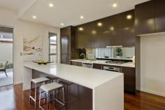 2/16 Birkalla Terrace Plympton SA 5038 
 
Million-dollar looks and courtyard convenience minus the trendy-suburb 
price tag; find all this and more in peaceful Plympton, minutes to 
Glenelg beaches and Jetty Road attractions. 
 
Designed and built by HIA award-winners, and tucked privately at the 
rear of an exclusive community of three, this stunning 3-bedroom, 
2-bathroom home sets the benchmark for contemporary style and low 
maintenance liveability. Enjoy quality at its finest with 3-metre 
ceilings, 2.4-metre Cedar doors, solid Jarrah floors, Caesar Stone bench
 tops and stunning 2-pac cabinetry that will take a lifetime to fill. 
There's even a separate laundry packed full of floor-to-ceiling storage! 
 
Relax and entertain with 195m² of space, where stunning living areas wow
 with open-plan ease, flowing out to fully-paved alfresco recreation 
under the main roof. Enjoying the outdoors and fresh air has never been 
more tempting! 
 
Combining practicality and chic appeal, the kitchen is every 
entertainer's dream. With its waterfall ends, the lovely long island 
bench is a magnet for family and friends while quality stainless steel 
appliances will bring out the chef in you, never missing a moment with 
the mirrored splash. 
 
Beautiful big bedrooms and indulgent fully-tiled bathrooms featuring 
sumptuous Spanish basins and under-bench lighting, offer personal 
sanctuaries for you and your guests including a lust-have master suite 
with a walk-thru robe and pampering couple's ensuite. 
 
And it's all brand new and only a short walk to buses, K-Mart and the local shopping centre! 
 
Other Features: 
Security alarm 
Video intercom 
Ducted r/c air conditioning 
Premium built-in storage throughout 
Auto single garage with internal entry 
 
 
