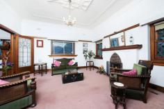 1156 Toorak Road, Camberwell, VIC, 3124 Occupying an elevated position, this graceful solid brick family home, surrounded by delightful trees has an abundance of space and natural light from the north Maintaining many original features of the era including leadlight windows, decorative high ceilings and picture rails, there is still scope to further update this grand residence to perfectly blend original charm with modern luxuries. The inviting entrance hall leads through to the formal lounge and separate formal dining (both with OFP) with three downstairs bedrooms serviced by main bathroom. The well equipped kitchen and adjacent family/meals proceed into the generously sized living room which flows out onto paved entertaining area and most favourable northern rear yard. The upper floor addition is ideal for a parent's domain with main bedroom (walk in robes and ensuite) opening onto delightful private timber deck with great aspects from a high vantage point. Spacious front and rear yards with double carport and workshop, complemented by distinguished greenery complete a well defined residence. Exceptionally sited only moments to tram, quality schooling and shops, this gracious home is ideal for the upcoming family lifestyle. Land: 18.8m x 46.8m (880sqm approx.) 