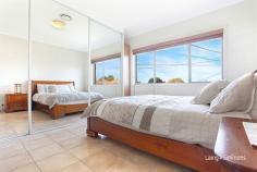 54 Sturdee Street Wentworthville NSW Spacious Family Home In A Privileged Position Prepare to be impressed with this stunning two level five bedroom brick veneer family home. Perched high on the hill in one of Wentworthville's best cul-de-sacs and offering various living areas, stunning views and only moments to schools, railway station and shopping centre. This home is ideal for the extended family or possibly two families.  -5 bedrooms -3 living areas -Formal and informal dining areas -2 stunning bathrooms plus a 3rd guest toilet -Open plan kitchen with breakfast bar -Balconies with fabulous views -Undercover outdoor entertaining areas -Electric lock-up garage  -Multiple off-street parking -Ducted air conditioning -Security alarm -599m2 block 