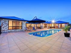 7 BEDROOMs + GRANNY FLAT on 1.5 ACRES!13 Slalom Cresent, Branyan, Qld 4670 This  Home  is ABSOLUTELY AMAZING!!! - 2 large Homes on 1.5 Acres (6,005m2) - Buy with the in-laws, or Buy with your Kids! Property features include:  - 7 Bedrooms in total (5 in house, 2 in unit)  - 4 Bathrooms in total (2 x ensuite's, 1 x main bathroom & 1 pool side bath)  - The 4th and 5th Bedroom in the House has been set up so it can also be a Bedroom with it's own lounge area  - Huge  Master Bedroom  , has ensuite, walk in robe & Pool access  - Open Plan lounge area (fully air conditioned )  - Stunning 'chef's style' kitchen, offers huge cupboard space &  stainless steel appliances   - Full 5 burner gas stove in kitchen, "top of the line Everything!"  - Enormous covered Outside Entertaining area, fully paved with built-in speakers, full down lights & fully fenced  - The Outside Entertaining area leads to the Beautiful 11.5m in- ground Pool , which also has its own entertaining area, power saving pump, large shade sail & its own outside bathroom.  - The Home also comes with its own Full size, fully air-conditioned 2 Bedroom unit, which has its own lounge Area, open plan kitchen, bathroom, laundry & attached garage  - The 2 bedroom unit itself is the size of a small home, and is "ABSOLUTELY PERFECT" for  Extended Family , the in-laws, a guest residence, or Kids that just won't move out of Home...  - The main house has a large separate laundry which is completely separate from the house.  - There's an abundance of water, with 3  water tanks  + a good size Dam with attached pump  - The home sits 'ABOVE FLOOD LEVEL' on a picturesque 1.5 Acres  - The home is, Fully fenced with Amazing landscaped gardens throughout, offering extreme privacy  - Absolutely perfect Location, the school bus stops 100m up the road, its also a 2 minute drive to the Sandy Hook Boat Ramp, and approximately 5 minutes to the Bundaberg CBD  - Owners have priced the Home for immediate Sale AGENT's COMMENTS:  This is without a doubt one of the most Amazing Homes Bundaberg has to offer. Excellent opportunity to purchase Under Replacement value, and this home would absolutely suit someone whose looking to buy with their kids or in-laws. The setup of the Home & unit offers completely separate and  independent living  for multiple people. Once you set foot in this Home... you won't want to leave.. Phone Marketing Agent Scott Wade Today for your more details or to arrange your Immediate Inspection. 