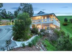 Shop 1 Birdwood Plaza, Shannon St Birdwood SA 5234 23.48 (58 acres). Magnificent, scenic, secluded and productive property. Stunning 2008 built double storey impressive home. Quality shedding, ample water and more, set in attractive gardens. Twelve paddocks across 70+ usable acres. Choose your lifestyle. LAND 23.48ha (58 acres) + additional land. This spectacular property, set in a tranquil location, provides lifestyle options and possibilities that make it a true standout. Whether it be simply enjoying this magnificent setting, including the beautiful establishment and panoramic vista, or utilising the land for grazing/light farming for income, this property is sure to impress. Entrance to the property is gained from a no through road, which enhances the seclusion. The very well formed driveway has concrete borders and leads to the residence and shedding facilities, merging to form a large parking bay. Vehicle tracks have been created throughout the property. The gardens surrounding the home have been thoughtfully designed to attract the birdlife that is drawn here by the colourful native plants and also to be easily maintained. Be prepared to share a small section of the property, where Missie K the resident kangaroo has made this place her home. The property is fenced into 12 paddocks and currently runs over 200 sheep, giving an indication of its productivity, and would suit horses, cattle or alpacas. There are water points to all paddocks via troughs, the seasonal dam and availability of bore water. With facilities such as cattle yards, crush and quality of fencing, the level of farming you wish to undertake is optional. The land varies in contour from gentle rising country to undulating terrain, which is dotted with some huge majestic gums. The views are superb from virtually every part of the property, in particular the plateau from which they are simply breathtaking. RESIDENCE A beautiful classic country-look characterises the modern refinements and interior living standards of this 6 year old double storey home. Upper and lower level decks, wide verandahs, timber railings and fretwork all merge to provide this stunning exterior. In addition, the oversized double carport (7.5m x 8.6m) and patio/entertainment area supply 356m2 of structure before stepping inside. Entrance to the upper level is gained from the carport to the large open plan living section. The space is embellished by the 9ft ceilings (10 on the lower lever), bright neutral tones, large windows and French doors. The kitchen is fitted with Omega appliances including a dishwasher, has a large breakfast bar, good cupboard space and floating timber floors, which are prominent throughout the home. An elegant touch are the four ceiling roses (seven in total). This area also incorporates the dining and family sections. There are few better places from which to greet the day than the main bedroom, thanks to its position in the home. It also has an ensuite bathroom and walk in robe. The upper level is completed by a versatile room, which is ideal as a fourth bedroom, office or guest room as it has its own toilet and basin. This light filled room would make a perfect artist studio, or convert to the likes of hairdressing facilities, the choice is yours. Separate living is to be had downstairs in the large games/recreation room. Bedrooms two and three have fitted robes, with the main bathroom and laundry on this level. Three split system units, along with the wood collected from the property to fuel the combustion heater, keep this gorgeous home comfortable year round. IMPROVEMENTS Every acreage property needs a quality shed and here the 40ft x 40ft shed with four sliding doors, concrete floor and power, is ideal. A 16ft x 10ft structure is located near the pony yard and ramp. Water storage is via interconnected poly tanks that hold 162,000 litres of rainwater and 24,000 litres of bore water. 