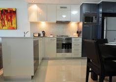 408/102 Esplanade Street, Darwin City NT reat opportunity to secure a Two bedroom, Two bathroom, beautifully furnished apartment on  Darwin 's Esplanade; Darwin's best location. Close to restaurants and the Darwin Mall this level 4 apartment is securely tenanted until 2017. This well presented and maintained complex offers fabulous recreational facilities including a swimming pool and sun deck, state of the art gym and undercover barbecue entertaining area. Located directly opposite Darwins Esplanade with beautiful parks and ocean vistas. Think of the long term value of this investment  property  and secure it today. - Funky-modern decor makes this well maintained apartment a  home  away from home - Stylish kitchen with modern stainless steel appliances -  Open  plan living/dining with glass sliders onto Balcony, perfect area to unwind after work - Generous sized master bedroom features built in robes and stylish ensuite - Fully tiled throughout, equipped with split-system air conditioning - Complex includes modern, L-shaped swimming pool, onsite gym and entertaining area with a barbecue to cater for those extra pleasures in life - Modern finishes and tiles compliment the main bathroom and ensuite - Two car spaces finish off the package to this inner city piece of paradise 
