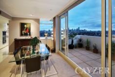  127 Beach St Port Melbourne VIC 3207 Breathtaking 270 degree bay and city views from this exceptional 
Beacon Cove waterfront apartment offering the ultimate in bayside 
living. Located in the most sought-after position occupying the entire 
eastern end of the 11th floor, this sensational apartment offers 
outstanding views from every room boasting spacious accommodation 
throughout. Comprising: Security entrance, spacious north-facing main 
bedroom (enjoying unforgettable city skyline views and a full ensuite 
bathroom), a further two spacious double bedrooms (with walk-in robe and
 study alcove), modern central bathroom, impressive open plan living 
room and separate dining area opening onto entertainers terrace ideal 
for alfresco living and enjoying martinis as the sun sets on those balmy
 nights plus a further two large balconies. Beautifully appointed fully 
equipped kitchen with sun-drenched family room and separate laundry. 
Features: Two side by side basement car parks beside the lifts, large 
storage cage, heating/cooling, swimming pool and live in caretaker. 
Don't miss this exclusive sub-penthouse offering the most spectacular 
views of Port Phillip Bay and beyond you will ever see. Only moments 
away from the newly renovated Princess Pier, First Point beach, Station 
Pier precinct and 109 city light rail 
