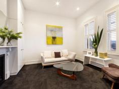  173 Nelson Road South Melbourne VIC 3205 The inspired design and the attention to detail with which this landmark 1880's double fronted Victorian has been renovated reveal an un-paralleled commitment to luxury and a perfectionist's approach to quality. The result? A sanctuary of inner city excellence. 4-5 bedroom flexibility enhances a floor-plan in which the soaring ceilings and perfect proportions of the period rooms are matched by striking contemporary spaces in a superb zinc clad extension including a living/dining domain defined by American Oak floors, seamless flow to a landscaped backdrop and an open plan kitchen featuring a 6.1m Calacatta marble bench, 108 bottle wine cellar and Blum fitted walk-in pantry. Two ensuites and a sublime central bathroom with Italian tiles, sub floor heating and indoor-outdoor showers complement seductive accommodation including a huge upstairs master bedroom with stunning ensuite and custom fitted walk-in robes. A bright study space, a remarkable central lightwell, heating/cooling, beautiful light fittings and massive storage only start to tell the story of the additional attractions that define this stunning home a minute's walk from St Vincent Gardens. 