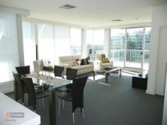 903/19 Holdfast Promenade Glenelg SA 5045 Spacious private top floor apartment with quality resort style facilities for a carefree lifestyle to travel, relax or entertain. This Platinum apartment boasts a large north/easterly aspect entertaining balcony with spectacular panoramic views of coast, marina and Adelaide Hills. It offers spacious layout offering open plan living, three large bedrooms master with walk in robe and beautifully appointed ensuite, Along with 2 undercover car parks, storage cage and exclusive access to luxurious lap pool, gym, spa and steam room. Located in the very heart of Adelaide's premier and vibrant beach community (The Bay). Only a very short stroll to enjoy coffee, fine dining or casual eating, a drink, extensive shopping or just a swim at the beach. Don't just let anybody tell you about it, come and see it for yourself and judge first hand. You won't be disappointed. 