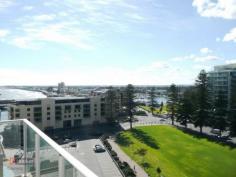 903/19 Holdfast Promenade Glenelg SA 5045 Spacious private top floor apartment with quality resort style facilities for a carefree lifestyle to travel, relax or entertain. This Platinum apartment boasts a large north/easterly aspect entertaining balcony with spectacular panoramic views of coast, marina and Adelaide Hills. It offers spacious layout offering open plan living, three large bedrooms master with walk in robe and beautifully appointed ensuite, Along with 2 undercover car parks, storage cage and exclusive access to luxurious lap pool, gym, spa and steam room. Located in the very heart of Adelaide's premier and vibrant beach community (The Bay). Only a very short stroll to enjoy coffee, fine dining or casual eating, a drink, extensive shopping or just a swim at the beach. Don't just let anybody tell you about it, come and see it for yourself and judge first hand. You won't be disappointed.