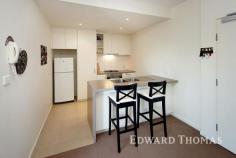  209/72 Altona Street, Kensington VIC Contemporary, secure and ultra easy to care for, this two bedroom plus study apartment in a fabulous city fringe position is surrounded by top amenities. Centred around an open living, dining and kitchen, filled with stainless steel appliances, the home boasts a generous covered balcony accessed from the living zone and both bedrooms (BIRs). There's an open study, plus a central bathroom, space-saving European laundry and streamlined panel heating. Elevator access and a designated undercover secure parking space with storage cage add further appeal, and so much is just a short stroll away: J.J. Holland Park and heated pool, train stations, primary schools, popular Kensington Village cafes and shops. - See more at: http://www.edwardthomas.com.au/buy/listing/7403487/#sthash.zPSwr00I.dpuf 