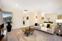 2/15 Parer Street Burwood VIC 3125 One of only two, enjoying sunny seclusion at the rear, this impressive single level residence's inviting spaces are enhanced by private outdoor proportions that appreciate the natural asset of north facing aspects. Generous living and dining areas and a stylish, spacious kitchen/meals zone each open independently to a paved courtyard created to offer ideal environs for entertaining. A main bedroom with ensuite and walk-in robes, zoned separately from two further bedrooms and a central bathroom add to the character, quality and comfort of a design that's complemented by ducted heating, evaporative cooling, built in gas BBQ and the convenience of a double RC garage. PLC, Wattle Park, tram routes and Burwood Village provide auspicious surroundings for a property of outstanding appeal. 