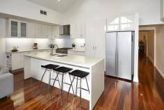  27 Blazey Street, Richmond VIC Classical elements and contemporary excellence are intelligently balanced by this bright, beautifully renovated period residence, complemented by a Richmond pocket offering quiet proximity to Victoria Gardens shopping, Bridge Road and the Yarra’s river bank bike paths. Spotted gum floorboards and romantic original pressed metal ceilings reflect the skill, style and sensitivity with which comprehensive updating has been completed throughout a floor-plan that offers three bedrooms, each with built in robes, two retaining period fire places. A distinctive designer bathroom makes a quality contribution before a north facing living/dining area delivers dynamic dimensions featuring a Jetmaster fire-place, cathedral ceilings and a Caesar-stone kitchen with soft closing storage. Double glazed bi-fold doors to a landscaped courtyard conclude a perfect example of ‘walk in and enjoy’ proportions, further enhanced by ducted heating/ refrigerated air-conditioning, alarm and large shed. 