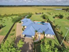 7 BEDROOMs + GRANNY FLAT on 1.5 ACRES!13 Slalom Cresent, Branyan, Qld 4670 This  Home  is ABSOLUTELY AMAZING!!! - 2 large Homes on 1.5 Acres (6,005m2) - Buy with the in-laws, or Buy with your Kids! Property features include:  - 7 Bedrooms in total (5 in house, 2 in unit)  - 4 Bathrooms in total (2 x ensuite's, 1 x main bathroom & 1 pool side bath)  - The 4th and 5th Bedroom in the House has been set up so it can also be a Bedroom with it's own lounge area  - Huge  Master Bedroom  , has ensuite, walk in robe & Pool access  - Open Plan lounge area (fully air conditioned )  - Stunning 'chef's style' kitchen, offers huge cupboard space &  stainless steel appliances   - Full 5 burner gas stove in kitchen, "top of the line Everything!"  - Enormous covered Outside Entertaining area, fully paved with built-in speakers, full down lights & fully fenced  - The Outside Entertaining area leads to the Beautiful 11.5m in- ground Pool , which also has its own entertaining area, power saving pump, large shade sail & its own outside bathroom.  - The Home also comes with its own Full size, fully air-conditioned 2 Bedroom unit, which has its own lounge Area, open plan kitchen, bathroom, laundry & attached garage  - The 2 bedroom unit itself is the size of a small home, and is "ABSOLUTELY PERFECT" for  Extended Family , the in-laws, a guest residence, or Kids that just won't move out of Home...  - The main house has a large separate laundry which is completely separate from the house.  - There's an abundance of water, with 3  water tanks  + a good size Dam with attached pump  - The home sits 'ABOVE FLOOD LEVEL' on a picturesque 1.5 Acres  - The home is, Fully fenced with Amazing landscaped gardens throughout, offering extreme privacy  - Absolutely perfect Location, the school bus stops 100m up the road, its also a 2 minute drive to the Sandy Hook Boat Ramp, and approximately 5 minutes to the Bundaberg CBD  - Owners have priced the Home for immediate Sale AGENT's COMMENTS:  This is without a doubt one of the most Amazing Homes Bundaberg has to offer. Excellent opportunity to purchase Under Replacement value, and this home would absolutely suit someone whose looking to buy with their kids or in-laws. The setup of the Home & unit offers completely separate and  independent living  for multiple people. Once you set foot in this Home... you won't want to leave.. Phone Marketing Agent Scott Wade Today for your more details or to arrange your Immediate Inspection. 