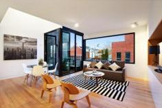  FOR SALE    $1,050,000 3 2 1 STUNNING 5 LEVEL TOWNHOUSE WITH ROOFTOP TERRACE! 8 LITTLE DRYBURGH ST  NORTH MELBOURNE In the heart of North  Melbourne , this stunning near new residence offers a fine executive lifestyle with its chic  contemporary design , luxury appointments and sensational 300 degree city views from a roof top terrace. Designed by architects Freadman White, this property has been finished to exacting standards. Filled with natural light, the  home 's ultra stylish interior boasts three double bedrooms and two stunning bathrooms. The large double height living area features a separate balcony and kitchen with state-of-the-art fittings and Miele appliances. Other stand-out features include a glass fronted garage/home office (mixed use residential), energy efficient components, double-glazed windows and large skylights, all in an unbeatable location. Walk to North Melbourne train station, Errol St cafes and shopping, Melbourne University, University High School, trams and the CBD   Property ID 2697052 Inspection Times Contact agent for details Land  Size 45 m2 Land Size 45 m2 