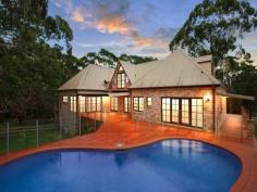 478 Empire Bay Drive Empire Bay NSW 2257 SUPERB ACREAGE - JUST MINUTES FROM KILLCARE, MACMASTERS, AVOCA & TERRIGAL BEACHES. This superb, Master Built home, boasts plenty of space for a large family. There are 6 bedrooms, built-in robes, two with en-suites, opening onto balconies or verandas. A separate lounge, with cosy fire, separate dining, family and rumpus rooms and there is even a library, store rooms and an office. A separate teenage or guest wing opens onto vast deck areas that surround the pool. 3 metre and vaulted ceilings throughout add to the feeling of space. Double hung cedar windows and cedar doors are a feature with wide wraparound verandas that capture the winter sun and summer breezes. A permanent dam with watering system. All set on nearly 4 acres with many other improvements. Minutes to schools and major centres. 