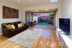 243 Danks Street, ALBERT PARK VIC 3206 Beautifully renovated Victorian combines period features with modern day architecture. Comprising: Two bedrooms (with built-in robes) and family size central bathroom (with stone bench top, stylish stone tiles and Villeroy Boch bath and toilet), kitchen (with Miele induction stove top and oven, dishwasher and stone breakfast bar) opening to expansive dining/family room. Rear bi-fold glass doors open onto covered alfresco area and garden plus rear laneway access for a vehicle. Upstairs: Main bedroom (with two robes and large roof storage), second modern bathroom and living area/parents' retreat with a terrace. Features: Beautiful polished floorboards, premium fittings, LED lighting throughout, central heating and cooling, solar power, internet wired house, under stairs storage and a garden shed further compliment this wonderful property. 