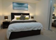 408/102 Esplanade Street, Darwin City NT reat opportunity to secure a Two bedroom, Two bathroom, beautifully furnished apartment on  Darwin 's Esplanade; Darwin's best location. Close to restaurants and the Darwin Mall this level 4 apartment is securely tenanted until 2017. This well presented and maintained complex offers fabulous recreational facilities including a swimming pool and sun deck, state of the art gym and undercover barbecue entertaining area. Located directly opposite Darwins Esplanade with beautiful parks and ocean vistas. Think of the long term value of this investment  property  and secure it today. - Funky-modern decor makes this well maintained apartment a  home  away from home - Stylish kitchen with modern stainless steel appliances -  Open  plan living/dining with glass sliders onto Balcony, perfect area to unwind after work - Generous sized master bedroom features built in robes and stylish ensuite - Fully tiled throughout, equipped with split-system air conditioning - Complex includes modern, L-shaped swimming pool, onsite gym and entertaining area with a barbecue to cater for those extra pleasures in life - Modern finishes and tiles compliment the main bathroom and ensuite - Two car spaces finish off the package to this inner city piece of paradise 