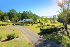 21 Coleman Farm Rd Yandina QLD 4561 IDYLLIC 1.5 ACRE FAMILY RETREAT Located in a picturesque quiet rural setting just 5 minutes from local shops12 mins to our regional hospital and 20 mins to Maroochydore and beaches, this immaculately presented property is ideally suited for young active families needing room or alternatively those looking for a lifestyle property. The modern ducted a/c home has a separate childrens area and a central living area opening out onto a delightful north facing alfresco dining/entertainment area complete with a spa and tropical pebble pool with a waterfall. The home sits in the middle of its manicured 1.5 acres with the added bonus of town water and comes with lots of extras including 3kw solar and hot water and lots of room for all the extra cars, caravans, boats etc in the two 6x6m sheds that are located behind the home. The presentation of this immaculately presented home on its delightful flat allotment all combine to make this property extremely desirable and great value at the listed price of $675,000. Property Features     Ceiling fans     Deck     Dishwasher     Ducted Air-conditioning     Entertaining Area     Hot Plate     Material: Double Brick, Colorbond Roof     Oven     Rangehood     Sides Fenced     Split-system Air-conditioning     Style: Contemporary     View: North 