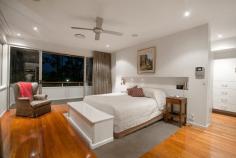  25 Aston Street, Toowong, QLD, 4066 Quality at its finest, this architectural designed home showcases light filled interiors, cross ventilation and premium quality finishes. Set on an enviable 1012sqm the home captures elevated views across Toowong to the river and city, an exclusive address just footsteps from prestigious schools, Toowong Village, trains, buses and the Ferry. No expense has been spared on this remarkable family home. •	Striking tri-level family residence •	Luxurious master suite with dressing room, ensuite and private terrace •	Five oversized bedrooms, four with ensuites and all with walk in robes •	Sleek gourmet kitchen with marble splash back and stone bench-tops, European appliances and butler’s pantry •	Floor to ceiling glass open to due north aspect at the rear •	A desirable low stress lifestyle is yours to be enjoyed •	Terraced entertaining decks, landscaped gardens with magnificent, mature trees •	Media room, adjacent to casual living, is the gate-way to a resort style pool area •	Perfect north/east aspect offer chic interiors flooded with light •	Three car garage, ample storage and air conditioned wine cellar •	15 minutes or less to the Brisbane CBD, Golf Courses, UQ, QUT 