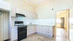  252 Lutwyche Rd Windsor Qld 4030 Positioned 3KM to Brisbane CBD, walk across the road to the bus stop or 200m to railway. Ideal set up for dual living with 4 bedrooms for the family upstairs and a self contained one bedroom down stairs. Great investment or family home! 