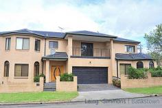  41 Tyalgum Ave Panania NSW 2213 Double front 4 bedroom duplex home. Huge lounge-room.  Modern kitchen with granite bench-top and dining areas.  Master bedroom with en-suite and walk-in robe and balcony.  Double lock-up garage with internal access and remote control.  Under covered entertaining area.  Fully ducted air conditioning and ducted vacuum system.  Stroll to Shops, Revesby Station and Park.  Vendor committed – Must be Sold 