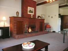 24 Smith Street, MYRTLEFORD, VIC Circa 1935 of solid brick construction and extensively renovated in the 
late 1980's this charming home is only a short walk to the town centre. 
With many features of the era - high ceilings, wide entry hallway, 
leadlight windows, ornate cornices, wide architraves, picture rails and 
deep window sills the home includes - 3 spacious bedrooms, a formal 
lounge with a built in combustion wood heater, open fire place in the 
dining room, large open fire place in the kitchen/family room, tiled 
bathroom, electric kitchen with dishwasher, large amount of storage area
 and double garage. A handy workshop, wood storage area, outside toilet,
 wide back verandah and 900 square metre flat block of land make the 
property suited to a wide range of home owners. 