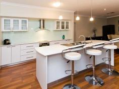  2 Kareela Road, RIVERTON, WA 6148 As ‘New’ large family home in cul de sac location. Quality built 4 bed 2 bath plus study home on over 800 sqm reticulated block. Only short walk to the popular ‘Queen of Apostles’ school and located in the sought after ‘Rossmoyne Senior High School Zone’. With quality appliances and fixtures this residence has a large home theatre, large main bedroom with ensuite and his and her WIR’s. The kitchen is open style and overlooks the family room and formal dining areas. 