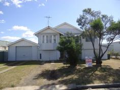  3 Victoria St Bundaberg East QLD 4670 Property ID: #2710527 QUEENSLANDER ON 1,012m2 INDUSTRIAL BLOCK 4 1 2 Zoning - Low Impact Industry. Live or rent the house, develop the back. Upper level of the Queenslander features 4 carpeted bedrooms, combined lounge and dining room. Front sunroom, separate kitchen with island bench. Separate toilet and bathroom, gas cooking and hotwater. Downstairs is laundry area, 2 storage area's or extra car spaces and fully concreted. Located next to Bundy Ice.  Inspection Times Contact agent for details Land Size 1012 m2 Features •Secure Parking 