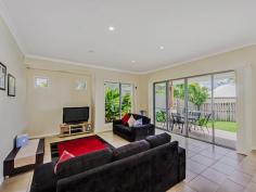 40 Ragamuffin Drive West Coomera Waters Qld 4209. Spacious Split Level Four Bedroom Family Home within the prestigious Coomera Waters Estate This
 spacious Four bedroom family home offers a spacious split level design 
over three levels, and is located within walking distance of recreation 
centre consisting of a pool and tennis courts within beautiful Coomera 
Waters. This modern family home offers a sense of spaciousness 
with it's split level design. The are several living spaces, ideal for a
 family living from the generous sunken lounge opening out to the 
covered outdoor entertaining area to the separate multipurpose media 
room which may be used as a second lounge. Features Include: - Master bedroom with walk in robe, airconditioning and spacious ensuite complete with double basin and stone vanity tops - Three other bedrooms with built in robes and ceiling fans - Spacious modern kitchen with granite benchtops, gas cooking, stainless steel appliances and storage cupboards - Tiled dining room with split system AC - Separate carpeted multipurpose media room which could be used as a 2nd lounge - Large Study Nook with a Built in Work Space - Sunken lounge opening onto the outdoor entertaining area - Fully fenced backyard, ideal for a children's play area - Access to all ... show more View Sold Properties for this Location View Auction Results General Features Property Type: House Bedrooms: 4 Bathrooms: 2 Land Size: 827 m² (approx) Price per m²: $688 Outdoor Features Garage Spaces: 2 