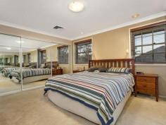48 Samuel St Peakhurst NSW 2210 Family Living - Location Plus Enjoy
 a contemporary lifestyle of style and comfort in this immaculately 
presented dual level home, which is perfectly designed to easily 
accommodate a growing family. The home features an open floor plan, 
formal and informal living areas, drive through lock up garage to yard 
and bonus double lock up garage with an excellent entertaining area. 
Only minutes walk to Peakhurst & Lugarno shops, Cafe's, schools and 
parklands. - 4 bedrooms all with built in robes + potential 5th bedroom or home office downstairs - Huge main bedroom with massive ensuite and built in robe - Upstairs rumpus/family room perfect for the kids to watch movies and play - Open and spacious light filled formal and informal living areas - 3 way main bathroom with separate shower and toilet - Chefs kitchen with stainless steel appliances and gas cooking - Ducted air conditioning upstairs and split system air conditioning downstairs - Internal laundry with external access + bonus 3rd toilet - Backyard perfect for entertaining and the kids to run around and play - Drive through lock up garage to backyard + double lock up garage with separate workshop - Minutes' walk to Peakhurst & Lugarno shops, Cafe's, schools and parklands   Property Snapshot Property Type: House