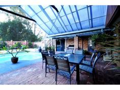  11 Ballidon Crescent Carine WA 6020 Traditionally designed and quality crafted family residence, situated in a tranquil park side location, unrivalled in position by any other in this popular and sought after family suburb. Generous size rooms, high ceilings, bay windows, French doors and a lavish use of natural timber throughout, combine to create a truly unique and inviting atmosphere over two exciting levels. Accommodation comprises of five very large bedrooms, two bathrooms, three separate living areas over both levels plus a large, contemporary style, centrally located kitchen forming the heart of the home. Overlooking a fabulous and private rear garden with a sunny north aspect, the kitchen enjoys a command post view over an expansive “all seasons” outdoor entertaining area, a true swimmers pool and the treetops of ‘Ballidon Park’. Both bathrooms upstairs have been recently refurbished to a high standard and there is a large laundry room with an extra shower and 3rd WC, handy with the pool nearby. There is a lot of storage space built in over both levels. - See more at: http://www.spraggongeorge.com.au/listings/residential_sale-211719-carine#sthash.rcMkcBSz.dpuf 