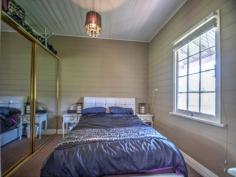  6 Eleanor Street Goulburn NSW 2580 Timber, 2 bedroom Cottage in Goulburn's East. Ideal for an investor or first home buyer. Possible rental return ($235 - $250 a week). Close to Goulburn East Primary.  Features include - 2 Bedrooms – Main with Built in  Kitchen - Stainless steel electric cook top, oven and range hood  Antique Beacon Hill Cast Iron Stove  Gas Heating  Modern Bathroom with Laundry  Rear Deck with views of the city  505m2 Block 