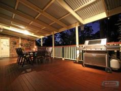  22 Charmaine Ct Burpengary QLD 4505 Superb Large Family Entertainer On Two Acres........... Situated on a large 8001m2 gently sloping block resides this fantastic 4 bedroom 3 bathroom 4 lockup spacious family home. To
 the first floor the property briefly comprises of sunken formal lounge,
 formal dinning room, large solid timber kitchen, open plan family room,
 four large bedrooms with walk-in robe and ensuite to the main and built
 in robes to all other bedrooms. Huge 10 x 4 m deck (approx.) over looking the stunning in-ground pool and expansive gardens. Downstairs
 an internal staircase leads to huge games room, (ideal for the kids or 
man cave),separate bathroom, large laundry and internal access to the 
double lockup garage, all over looking a large undercover tiled outdoor 
entertainment area and pool. Outside a large three bay shed ( 2 
doors and 1 bay workshop) huge water tanks fully fenced landscaped 
gardens with expansive grassed areas, a multitude of exotic fruit trees 
and small Vineyard, established trees and offering lots of privacy. With
 a secluded cul de sac position and surrounded by other homes of similar
 quality this fantastic property must make your short list. Features * Solar hot water * A/C *...show more     View Sold Properties for this Location     View Auction Results     General Features     Property Type:Acreage/Semi-Rural     Bedrooms:4     Bathrooms:3     Land Size:0.80ha (1.98 acres) (approx)     Indoor Features     Ensuite:1     Toilets:1     Workshop     Built-in Wardrobes     Rumpus Room     Air Conditioning     Outdoor Features     Remote Garage     Garage Spaces:4     Balcony     Outdoor Entertaining Area     Swimming Pool - Inground     Eco Friendly Features     Solar Hot Water     Water Tank 