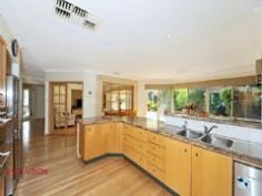  20 Dunvegan Road Applecross WA 6153 Spacious family home, large block in a dress circle blue chip location...........ticking all the boxes! If you are looking for a spacious and well designed family home for your growing family, in the prestigious Golden Triangle of Applecross, then look no further. A quality Rapley Wilkinson built home has a combination of generous living space, well separated for older or growing teens, huge number of bedrooms and a home office as well as ample storage throughout. 