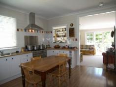  Katoomba NSW, 2780 Tradition with a contemporary edge and a real country feel! Painstakingly restored with an eye for detail this three or four bedroom roomy bungalow has it all! It has been re-wired and re-plumbed, has two completely new character bathrooms, a well-designed yummy new kitchen and dining room, all opening out to large living room and good size rear patio. High ceilings, original timber floors, beautiful new leadlight windows, and combustion wood fire. The rear garden is level (over 820sqms), all fully fenced, complete with a veggie patch and off street parking and all conveniently sited right in the heart of the Echo Point precinct. 