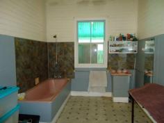  55 Barawell Street Stanthorpe Qld 4380 Set in the village of Wallangarra about 25 minutes from Stanthorpe and set on a generous allotment of 1,012m2. This home has plenty of space to offer, 4 large bedrooms, separate lounge room, eat in kitchen plus 2 bathrooms. Home is kept warm with a wood heater and with the addition of the old style combustion stove in the kitchen the winter months are not a problem. Very solid chamferboard home with enclosed front verandah a perfect North facing sunroom. Outside offers a 3 bay shed with built in inspection pit for the mechanically minded and a generous backyard. Located only a short walk from the general store and post office. Solid, spacious family home and competitively priced. 