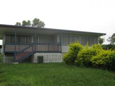  17 Queen Street Dallarnil QLD 4621 File 2986. Delightful 3 Bedroom Low Set Fibro Cottage in the small Country Township of Dallarnil on 1/2 acre block of land. A short walk to the Primary School & Local Store. Situated in a lovely Quiet part of Town app 25 minutes to Historic Childers & a further 10 minutes to Country Township of Biggenden. This lovely Cottage has recently been renovated & has been freshly painted throughout. * 3 Bedrooms. 2 With Built in Cupboards. * Polished Timber Floors Throughout. * Open Plan Dining/Kitchen/Lounge. * Bath with Shower over head & Basin. * Separate Toilet. * Built in Linen Cupboard. * Kitchen with Breakfast Bar & Electric Stove. * Front Verandah & Rear Deck. * 5,000 Gals Rain Water Tank & Fenced on 2 1/2 Sides. 