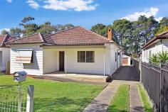 37 Hector St Sefton NSW 2162 Great Family Home Or Investment - Sefton High School Zone AUCTION This home has plenty to offer the growing family. Just imagine 5 good size bedrooms, the master with en-suite. A large family lounge room with open fireplace and sliding glass doors which opens to a lovely rear covered entertainment area overlooking the backyard and in-ground swimming pool. A timber kitchen with an open plan dining area, cook up a banquet whilst being able to chat to family and friends. There is also a lovely well appointed sunny bathroom, together with a spacious laundry with a 2nd toilet. A long wide driveway leads to a lock-up garage, or change this to a games room to compliment the outdoor living. The property is perfect for the growing family or investment as it is located meters away from Sefton Selective High School, easy walk to Sefton station & shops. Don’t miss out!!!! Approx Land Size: 13.105 x 45.08 = 588.1 sqm Address: 37 Hector St, Sefton Open House : Saturdays 1:00pm to 1:30pm Auction On-Site : Saturday 6th September 2014 at 1:30 pm Contact Allen Abed on 0421 531 360 or Le Ly on 0422 432 057  Property Type House Property ID 11444100292 Street Address 37 Hector Street Suburb Sefton Postcode 2162 Price AUCTION Land Area 588.1 sqm 