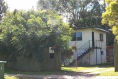  261 Duffield Rd Kallangur QLD 4503 She knows she's a bit of an ugly duckling but in the right hands, she
 can be renovated to be cool and comfy. Or you can even start fresh and 
demolish and build your brand new home. 
What she has in spades is plenty of land, 1007m2 to be exact. And being 
entirely fenced off, it's a safe, happy environment for a young family 
or pets who need room to run around. 
Situated close to Woolworths, bus, schools, childcare and doctors' 
rooms, she also boasts an expanse of parkland, right next door. 
A neat first home for a couple or a fantastic rental for an investor, 
this one deserves your attention. Once you inspect, your first thoughts 
will be "value for money". Just don't leave it too long! 
 