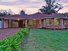 19 First Avenue, BICKLEY WA 6076.Welcome to this beautiful 1999 built FAMILY home set on the doorstep 
of the delights of the Bickley Valley. Lovingly created by Scott Park 
Homes with all the class and finish from an award winning builder, the 
outstanding workmanship is evident throughout. You will be proud to call
 the quality built house - HOME. 
 Inside there is plenty of room 
to spread out. This property has 4 large sized bedrooms - the master 
bedroom with a functional and appealing ensuite equipped with a 
luxurious spa bath. The living zones are expansive - Lounge, Dining, 
Family, Games/ Theatre and Meals. Under roof area is a substantial 
266sqm in total. Outside you have a good sized, easily accessible workshop, lawned area plus extensive patio surrounding 2 sides of the home. What
 a HOME this is, within minutes to Kalamunda and its myriad of services 
and highly regarded Schools and Colleges in Bickley, Carmel and 
Lesmurdie. Close to Welshpool Road for great access to the Airports and 
Perth City. For Private Inspection call Joanne Pottinger 0419 903 548. Property Features include: 1999 built, double brick and tile SCOTT PARK home 4 bedrooms and 2 modern bathrooms Main bedroom with Bay window, retreat plus spa bath Living areas: Formal Lounge, Dining, Family, Meals and Games/Theatre Gas cooking with a high bench topped kitchen, Bosch dishwasher 2 x Split system air-conditioners and wood heater Double Carport plus ample extra parking Drive through access to 6m x 5m workshop Private fully fenced 1386m block 
 Property Summary 
 Type: House Bedrooms: 4 Bathrooms: 2 Garage: 2 Open Parking: 2 Lot Size: 1386 sqm 
   
