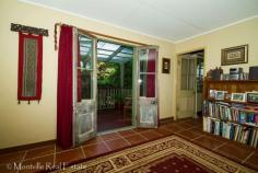  21 Kondalilla Falls Rd Flaxton QLD 4560  Artistic use of recycled building materials has resulted in a unique home with loads of character. The
 spacious cottage of 2 bedrooms plus study, features recycled French 
doors opening onto the terrace of the living room plus custom made 
cabinetry in the kitchen, laundry, bathroom and bedroom. Fully tiled 
throughout, the cottage sits privately on an 811m2 fully fenced block 
with a rustic pergola nestled amongst the established trees. The property is close enough to walk to the National Park, close to the bus stop and a short drive to the shops. Inspections are recommended Features     Terrace/paved     Pot-belly stove     Safety Switch              Fenced     Smoke Alarms Property Details Property Type:    House Bedrooms:    2 Bathrooms:    1 Garages:    1 Land Area:    811m2 