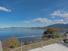 5 Koluri Court, LINDISFARNE, TAS 7015 Commanding spectacular 
views of the River Derwent, over to the Western Shore and back to the 
Eastern Shore this expansive family home is the ultimate waterfront 
abode. Nestled away in an exclusive enclave in Lindisfarne surrounded by
 other prestige homes this two storey home sits on a large block 
fronting a wide expanse of quiet river frontage - a unique and special 
offering. This residence has been home to the current owners for 
over 26 years, meticulously built and perfectly maintained and upgraded 
over the years it offers a versatile floor plan with a multitude of 
entertaining options and ambient living. On entering this magnificent home the family/dining room leads the large entertaining deck where
 superb waterfront views will amaze. The adjacent thoughtfully upgraded 
kitchen boasts quality appliances and combined with this large family 
room offers a perfect area for entertaining. This level is also host 
to a large formal dining room and sunken living room where light and 
space abounds - and offers comfortable living for all family members. A
 large second entertaining area or games room complete with bar and TV 
room on the main level leads to the expansive outdoor entertaining area 
complete with large in ground solar heated pool. There is also another 
bathroom with shower providing good amenity for the pool area nearby. The
 accommodation of the main house is set on the upper level and offers 4 
bedrooms, all with built in robes and a large family bathroom with 
separate spa bath and shower. Wake to the many moods of Mount Wellington
 across the River Derwent with the luxurious master bedroom complete 
with balcony, walk in robe and ensuite. This home is warm in 
winter with multiple heating options including a large open fire place 
in the formal living room, heat pumps, panel heaters and also a wood 
heater to create a beautiful atmosphere in winter from the family room 
overlooking the water. Downstairs there is a large 2 bedroom self
 contained flat with a large living/dining area separate kitchen and 
laundry. Two large bedrooms with built in robes and a central bathroom 
complete this great package. The outdoor terrace area is perfect for 
privacy from the main house and an automatic garage for this flat offers
 secure parking. Set on an easy care, child-friendly lawn with 
level access to the main residence and the 2 bedroom self contained unit
 this property is suitable for all types of buyers. Whether you want a 
large family home with an income producing unit or for older members of 
your family, extended family or a teenager at University - the 
possibilities are endless. Other features include: Double remote 
garage, additional off street parking, mere minutes walk to Lindisfarne 
Village, the walking tracks, sports grounds, local restaurants and 
cafes. Located a mere 10 minute drive to Hobart CBD and 15 minutes to 
Hobart International Airport. A luxurious, enviable lifestyle is on offer to those wanting privacy, waterfront position and convenience. Land Area : 1423 sqm Floor Area : 478 sqm 