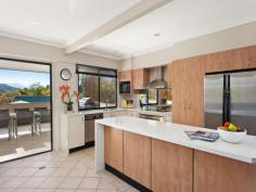  2/33 Simpsons Road, Bardon, Qld 4065 VIEW: SAT 11.00-11.30AM Architect Designed townhome: a fantastic 
inner city opportunity to purchase in a unique prime Bardon location, 
offering a layout with multiple open space design overlooking leafy Mt 
Cootha and low maintenance living. 

 First time this Townhome has been offered to the market in a highly 
exclusive complex: An extremely comfortable home which is well located 
in a quiet and secure complex with huge over-all area of 351.9m2. The 
modest façade provides only a snaphot of the numerous features that 
unfold over 3 levels of well appointed living. 

 MULTIPLE LIVING SPACES: On entry the private and unique large living
 room is ideal for a home office and has its own private charming 
courtyard. Large stylishly and functional designed living/dining and 
modern kitchen area leading directly onto an entertainers deck which 
makes entertaining a breeze. Spacious double garage opens onto a third
 parking space or the room is ideal for future rumpus. 3 spacious 
bedrooms, master bedroom with its own ensuite. Second and third bedroom
 have a lovely vista across Mt Cootha and bathroom with spa-bath is well
 located to bedrooms. 

 Design features:
 - Large Internal living area of 168.5 sq.m
 - Total area of 351.9 sq.m
 - Natural light & breezes
 - Charming courtyard
 - Home office / separate media room
 - Open plan dining/kitchen/living areas
 - Entertainers Deck overlooking Mt Cootha
 - Secure, private and quiet 

 Conveniently located within close proximity to St Josephs, Bardon 
and Rainworth Primary Schools, Stuartholme College, parks Walking 
distance to the Bardon restaurants and just a few minutes drive to 
Paddington and Rosalie Village. 

 This is a quality property and investment opportunity!
 Inspection a must. 
