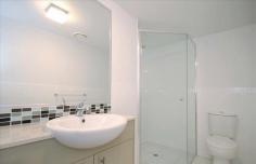  3/51 Elizabeth Street, Toowong, QLD 4066 Main bedroom has ensuite and sliding doors out to patio. Light & airy open plan living area which also opens out to a spacious tiled patio. Conveniently located less than 5 min drive from the Toowong Village and train station and public transport available to get you to the City and Brisbane River. •	Built ins •	Dishwasher •	Internal Laundry •	TV & Internet connections •	2 separate garages with remote controls •	Quiet location – 1 of 5 units in complex 