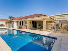  6 Bronzewing Link Beeliar WA 6164 The perfect balance of property and location. Consisting of; *Four large bedrooms all with built in robes *Two stunning bathrooms—main bathroom with bath, shower and vanity. Ensuite with shower, vanity and toilet *Massive open plan living areas including large meals and family room with stacker doors opening onto alfresco dining area *Separate carpeted games/home theatre *Large chefs kitchen with it all, including breakfast bar, overhead cupboards, gas hot plates, electric wall oven, dishwasher, microwave recess, pantry and room for that side by side fridge that you’ve always wanted *Laundry with overhead cupboards *Ducted reverse cycle air conditioning *Stunning timber flooring *3 Separate zones on the outside: The grassed area for the swings, the fully fenced below ground pool for the teenager’s and their friends and the alfresco for Mum and Dad *Garden shed *Double lockup garage with shoppers entry *Land: 598sqm Click on the video link to see more about this lovely home. You will not find a better property for this price! WOW FACTOR BIG TIME 