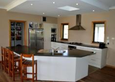 29 Geehi Circuit Jindabyne NSW 2627 Set on 1 acre this four 
bedroom, dual living zone home has a lovely northerly rural aspect. A 
very modern large kitchen family area separates the parents and children
 zones. Spotted gum timber floors with polished concrete heated 
floors through the wet areas and kitchen give the home a beautiful 
contract between the zones. A mixture of Gas, underfloor heating 
and hydronic heating keeps the home warm in winter along with the north 
penetrating sunshine. All the windows are double glazed and the hot water is solar with an electric booster. Out back for the bloke is a 11m x 9m shed and plenty of room for the family to run about. Features     Outdoor entertainment area     Fenced     Indoor entertainment area     Verandah     Smoke Alarms     Oven     Hot plate     Range hood     Dishwasher     Solar hot water system     Heaters Property Details Bedrooms        4 Bathrooms        1 Ensuites        1 Garages        4 Land Area        1 ac          Agent Details      Michael Henley Director Phone - 0264562562 Mobile - 0403 165 563