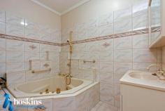 8 Vermont Street Blackburn South VIC 3130 Boasting a spacious interior designed with family in mind, this outstanding residence has a versatile floorplan. With a substantial covered rear deck plus a separate rumpus/home office, the effortless indoor/outdoor flow is perfect for modern family life. - Inviting family residence boasting generous proportions throughout - The large lounge features ornate Artex ceiling, adjoined to a generous dining room - Cook up a storm in the cook?s kitchen with s/steel dishwasher, island bench, plus meals/family zone - The large rumpus/family room is warmed by a gas log fire, - 4 comfortable bedrooms, including the master with walk-in robe and ensuite - A family bathroom and practical laundry keep everything sparkling and clean - The warm polished timber floors and ornate Artex ceiling create an instant ambience - Warmed by ducted heating and cooled by split system air conditioning, with security alarm system - Indoor/outdoor living is effortless thanks to a huge covered deck - A remote 2-car garage is oversized, ensuring maximum usability - The easy-care garden includes a vegie patch, water tank, and garden shed - Easy access to a choice of quality schools, bus, tram and train station, plus Deakin University The unrivalled convenience on offer here cannot be underestimated. Combine this with the potential to set up a home office with separate entrance and the opportunities are almost boundless. Inspection will not disappoint.