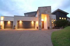  8-10 Kambah Place Reedy Creek Qld 4227 Relax and entertain with family and friends in the 9 metre salt water pool with 
attractive water feature and outdoor shower while enjoying complete privacy 
 Impress all with the Italian floor tiles throughout and Italian bench 
tops in the note worthy German Craft kitchen with additional plumbed fridge 
included and glass feature screen The Spotted gum floors literally light 
up the whole entrance and formal living area while the sandstone on the patios 
enhance the beauty of a the quiet serene setting The main bedroom offers 
amazing storage and wonderful ensuite with spa with exceptional furnishings and 
mesmerising wall paper rarely seen in Australian homes 
